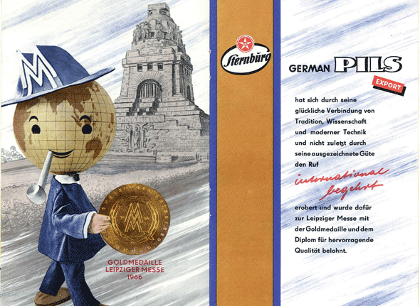 A drawing shows a mascot-like figure in front of the historic architecture Völkerschlachtdenkmal, holding a medal.